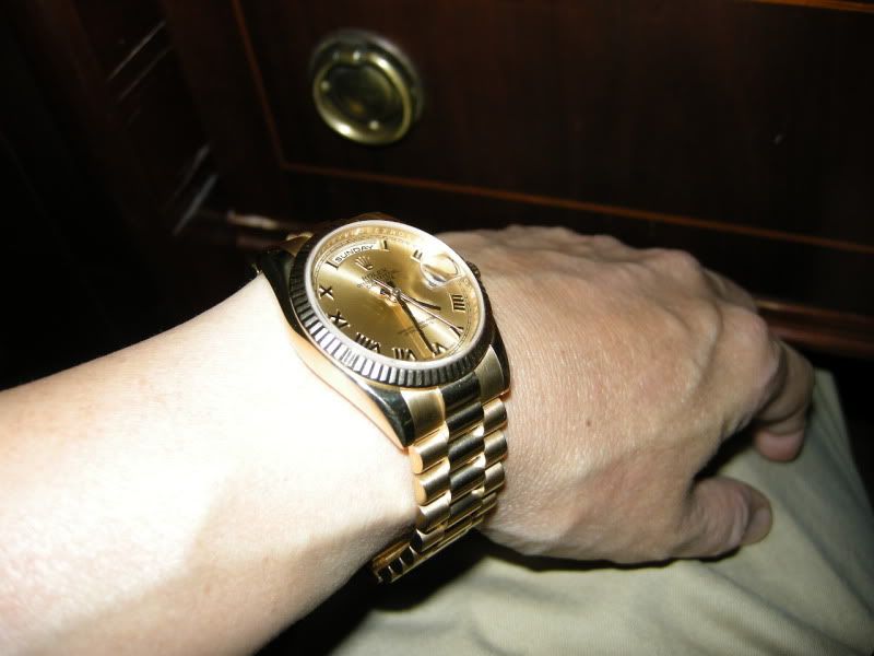 rolex day date on wrist